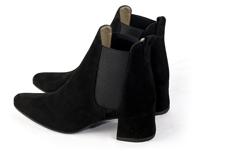 Matt black women's ankle boots, with elastics. Round toe. Low flare heels. Rear view - Florence KOOIJMAN